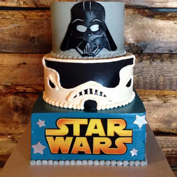 A star wars cake with darth vader and stormtrooper.