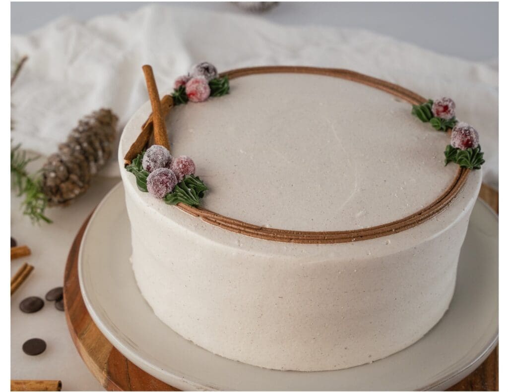 White cake with cinnamon and cranberries.